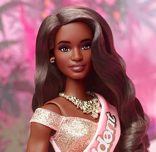 Barbie The Movie Doll President Wearing Shimmery Pink Gold Dress with Sash