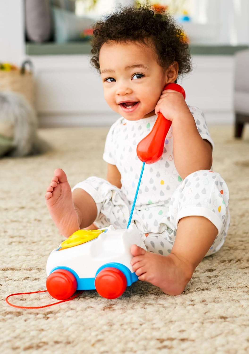 Fisher-Price Toddler Pull Toy Chatter Telephone Pretend Phone with Rotary Dial and Wheels